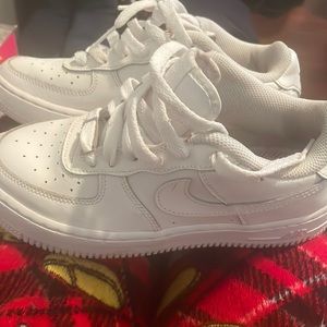 Nike Air Force 1’s it’s a white low top sneaker very comfortable very clean